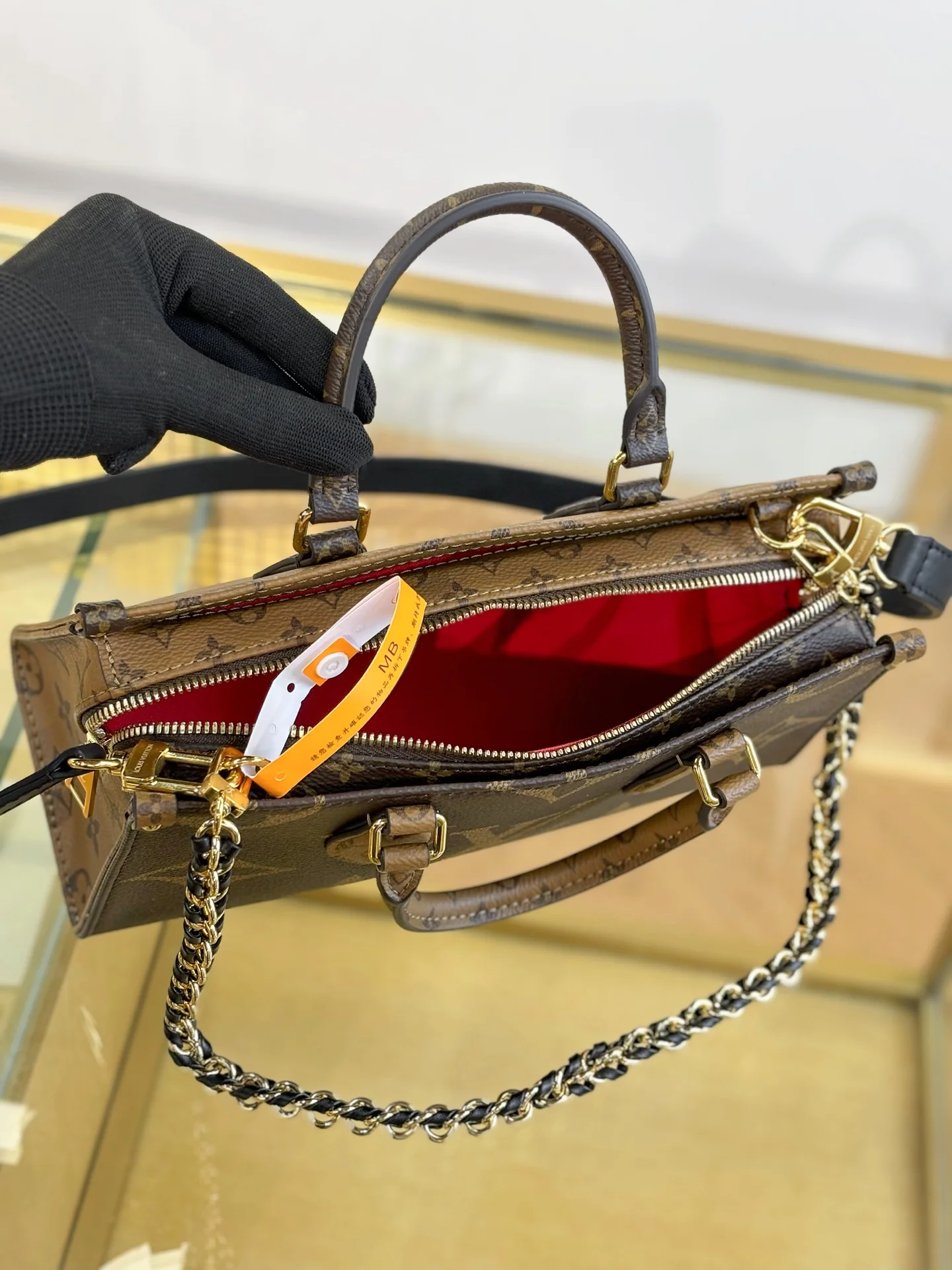 Louisvuitton Onthego East West Chain Handbag 25x13x10 cm - description_image5